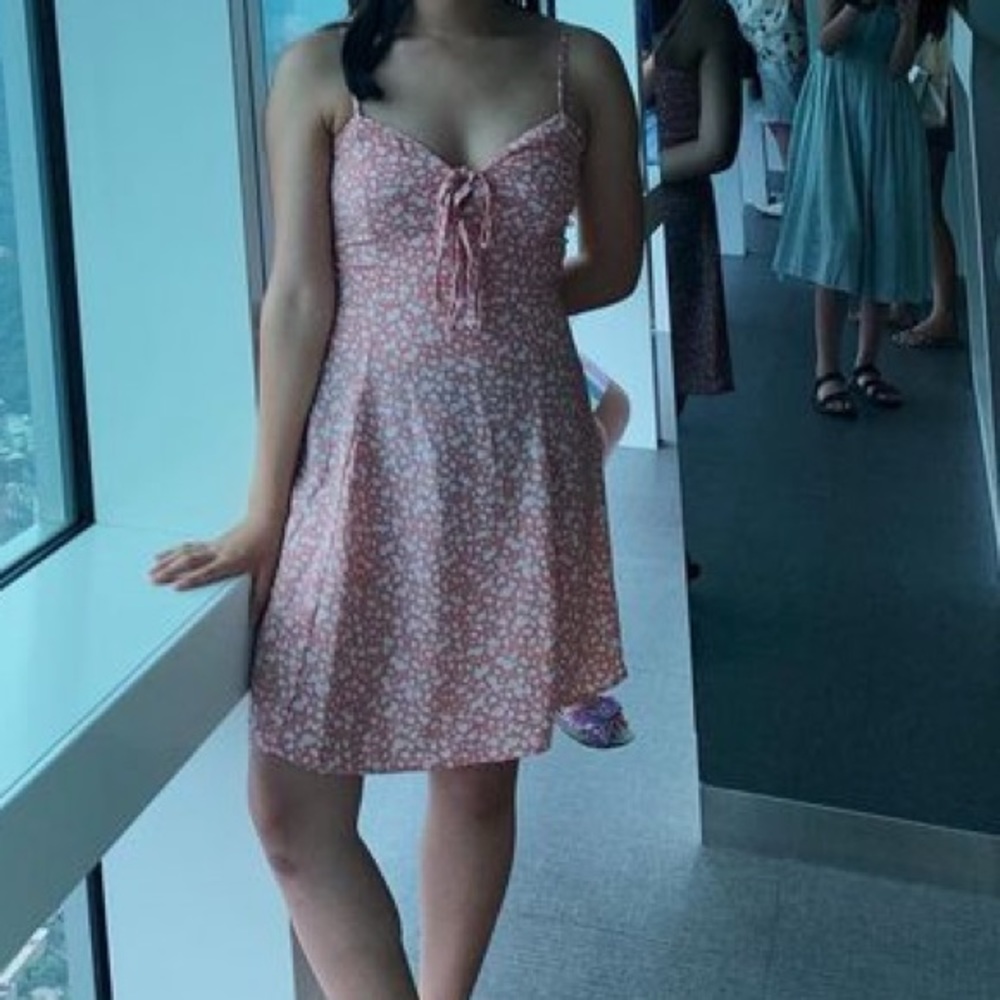 Pink dress with white flowers